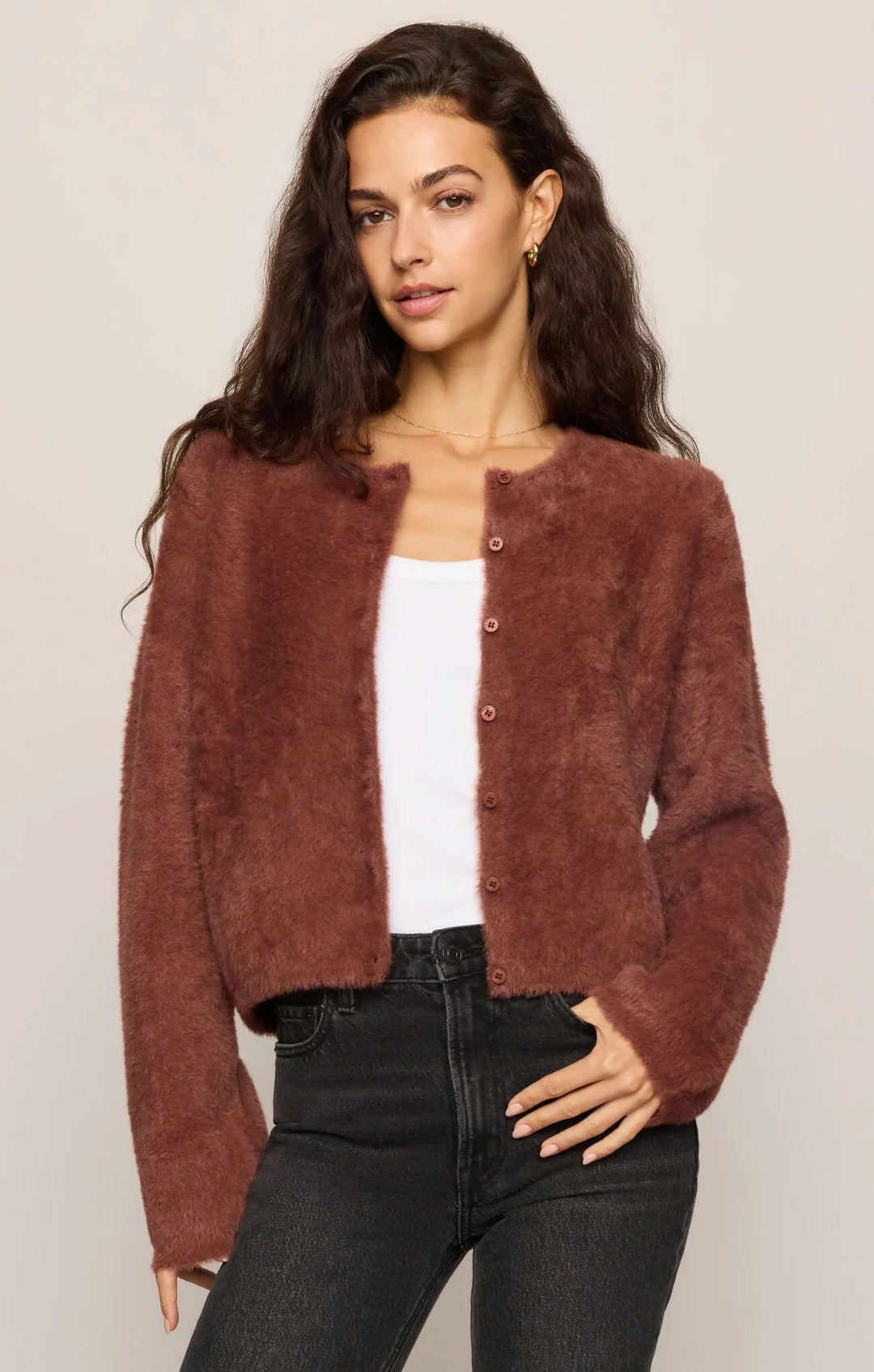 Woman wearing the Z Supply Winterglow fluffy cardigan in dark rosewood, a soft button-front knit with a crew neck.